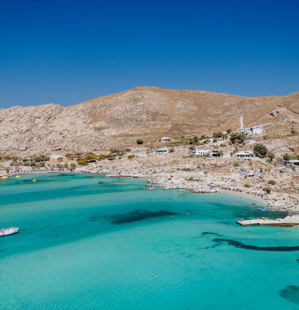 Turquoise bay and rocky coastline at Kolymbithres beach, Paros, Greece