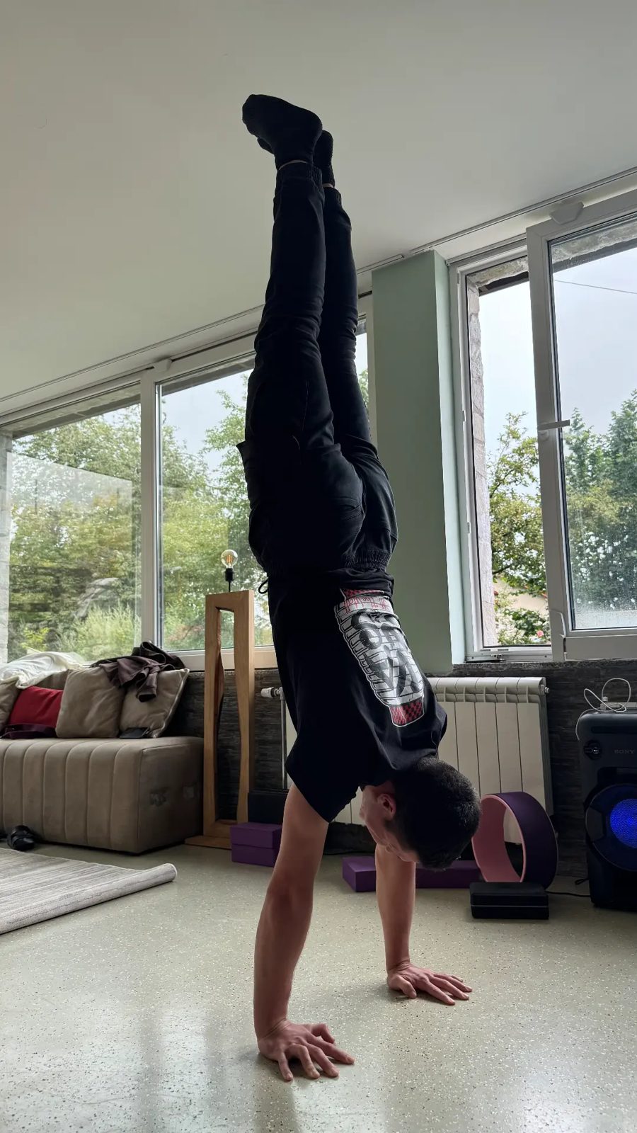 Handstand practice by the windows
