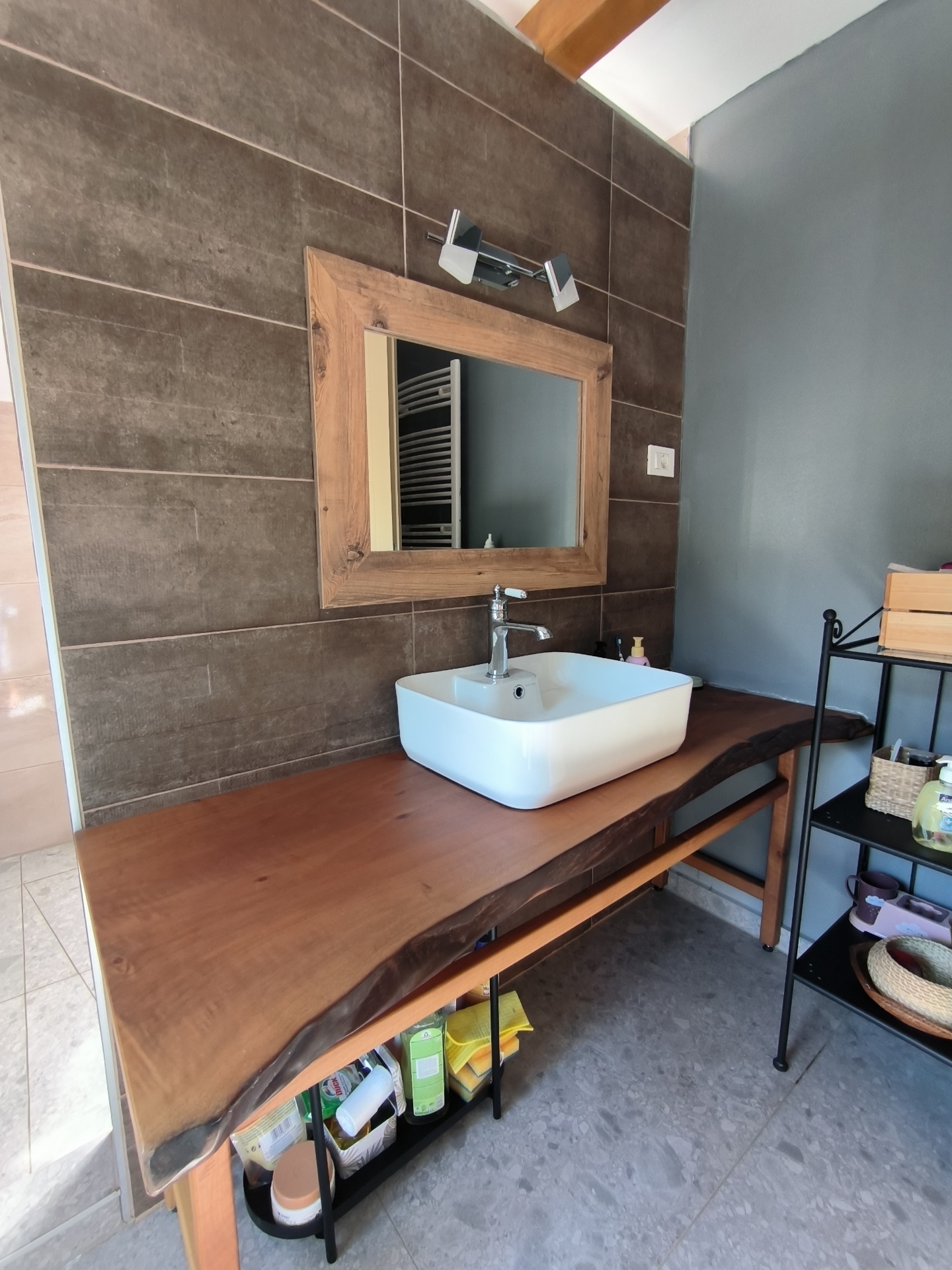 Villa bathroom with live-edge wood vanity