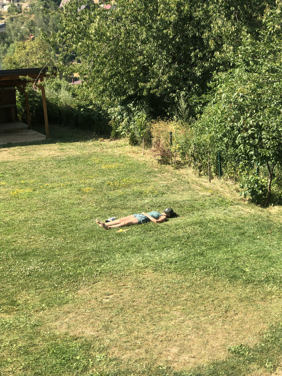Sunlit garden with welcoming grass at the villa
