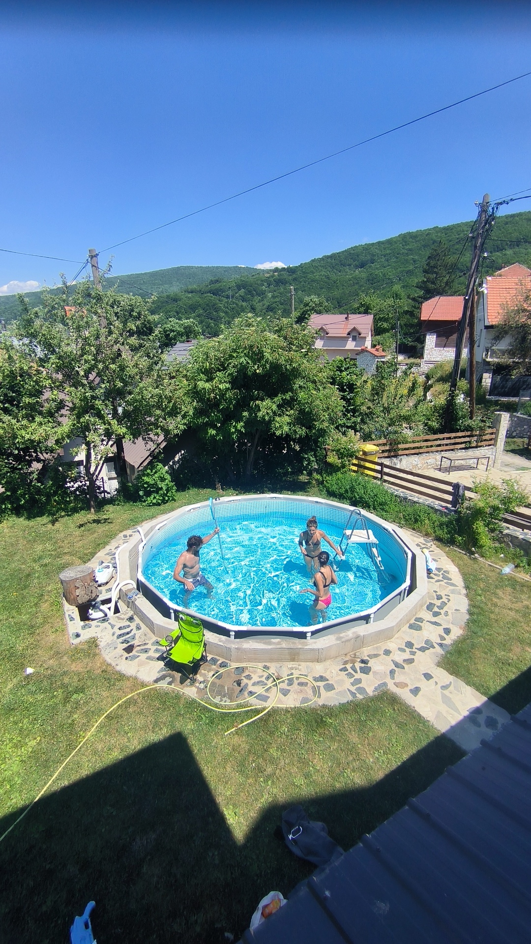 Pool in the villa garden with mountain backdrop