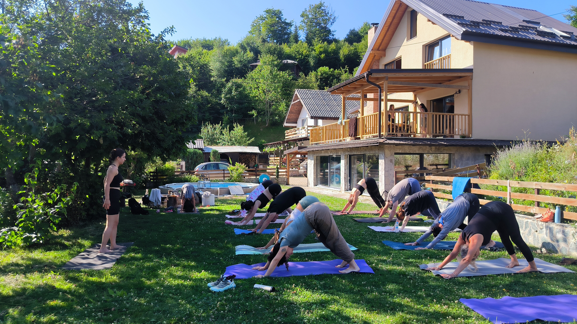 Morning movement practice on the villa lawn